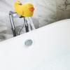 imageMunchkin Beak Bath Spout Cover Safety Guard with Builtin bubble bath dispenser YellowModern