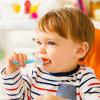 imageMunchkin Silicone Scoop Trainer Spoons with Choke Guard for Baby Led Weaning 4 Count PinkPurpleBlueGreen